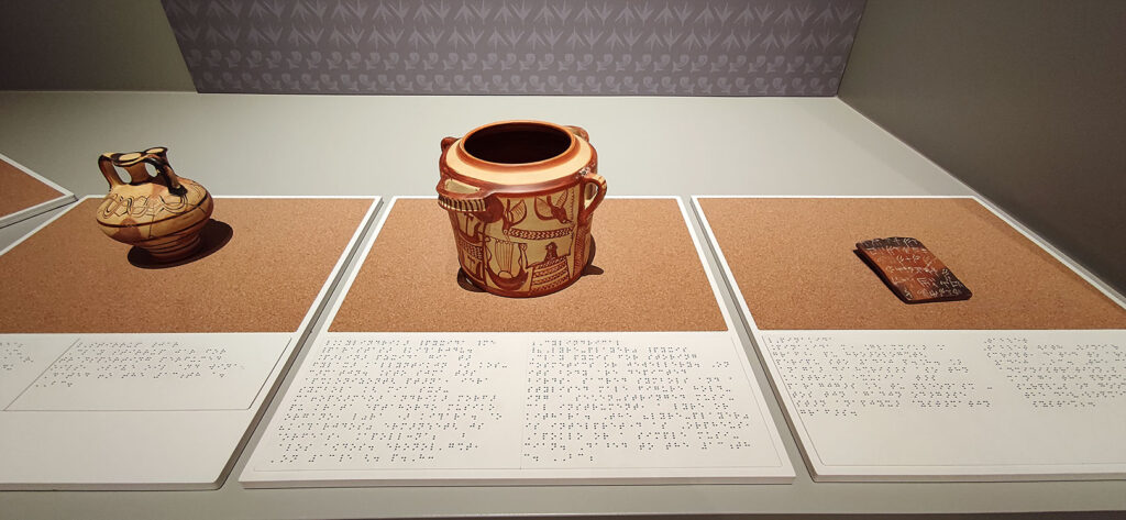 clay vessels with inscriptions in braille